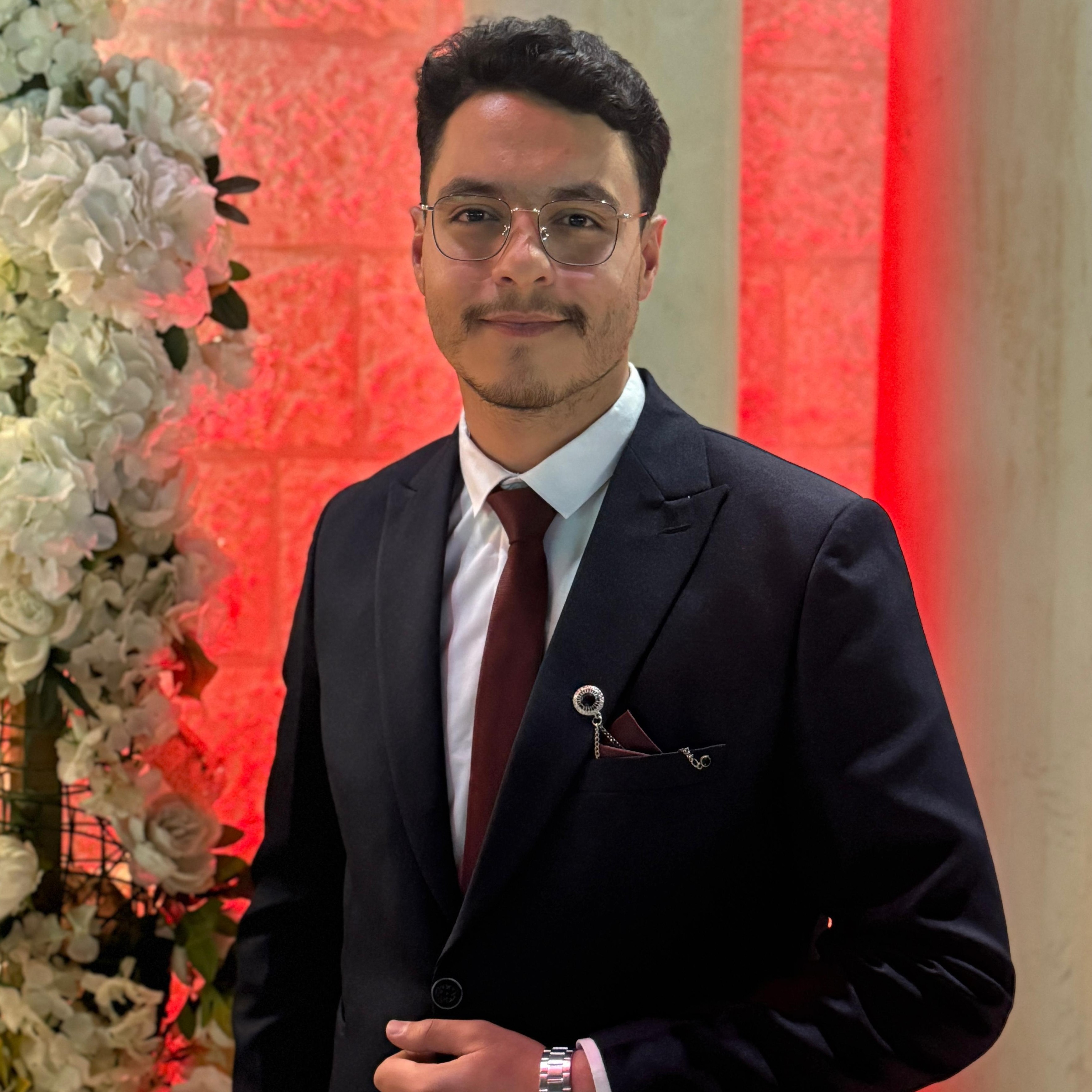 Belal Hamdan in a suit